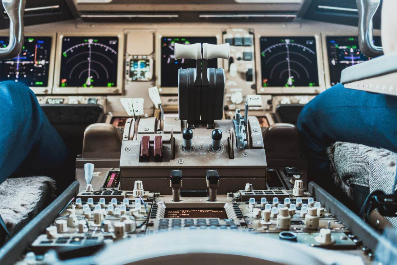 Digital control pannels in a commercial aircraft cockpit.